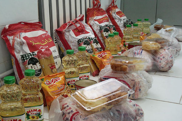۱۰۰ بسته غذایی میان خانواده های دارای افراد معلول شهرستان خنج توزیع می شود