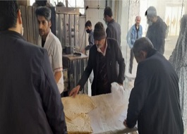 توزيع نان رايگان توسط جوانان کانون مسجد امام حسین(ع) در سنقر
