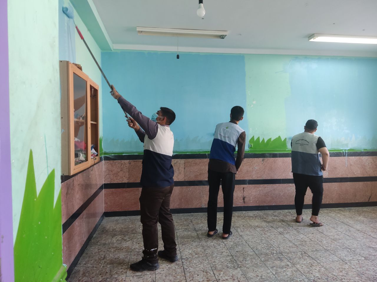 مرمت و رنگ آميزي مدرسه وحدت توسط کانون فرهنگي هنري موعود